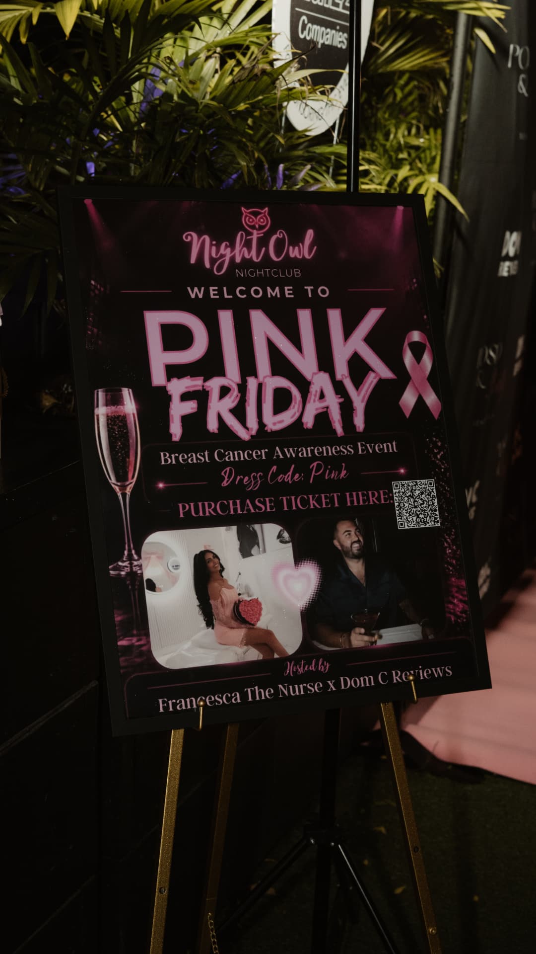 The Night Owl welcome sign for Pink Friday on an easel at the door